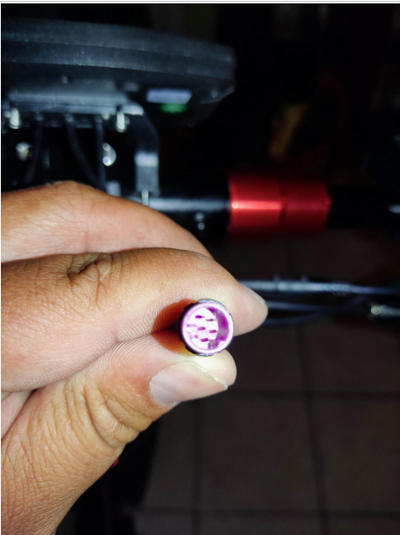 Electric scooter charger connector