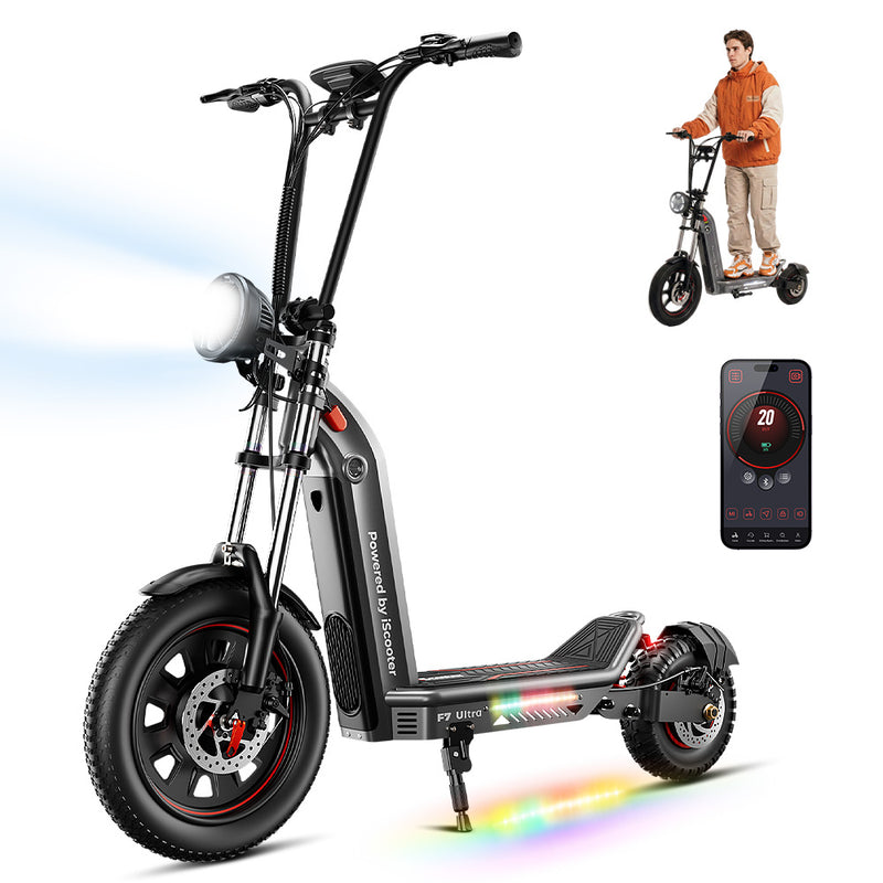 Close‑up of F7 Ultra scooter front wheel with thick tire, disc brake, and suspension forks integrated into sturdy frame, branded “Powered by iScooter,” paired with bright headlight beam and LED deck accents, emphasizing stability, safety, and modern design.