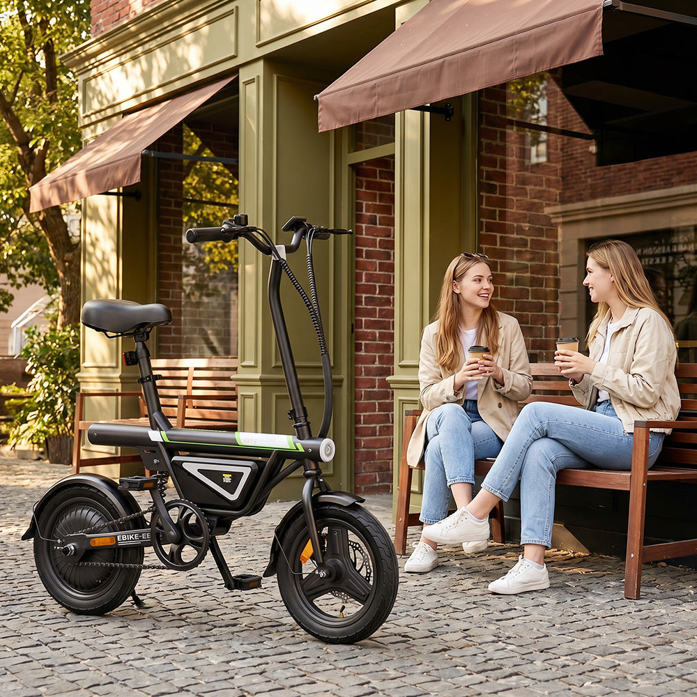 An urban lifestyle scene features the iScooter EB1S electric bike parked outside a café while two adults enjoy coffee nearby. The image highlights the compact folding frame, integrated battery, upright riding position, and sturdy wheels, showcasing the iScooter EB1S as a convenient, space-saving electric bike for city commuting, errands, and everyday leisure rides.
